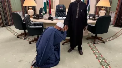 Photo of Reactions as Governor Bago visits, kneels before Tinubu