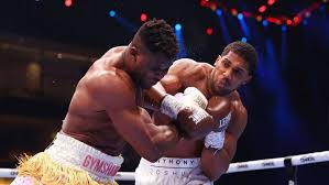 Photo of Anthony Joshua clinches second-round knockout win over Ngannou