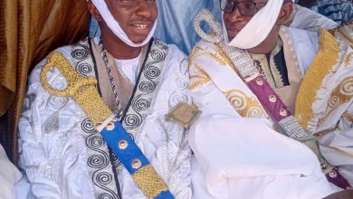 Photo of Ajia turbaned as Dan Amanar of Fune Emirate amidst royal grandeur
