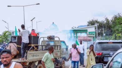 Photo of Commotion at National Assembly as police fire teargas at Senator Natasha’s supporters