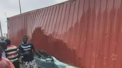 Photo of Three dead, others trapped as container falls on 4 tricycles carrying passengers