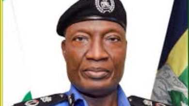 Photo of Police dismiss 4 officers over alleged killing of 7 traders